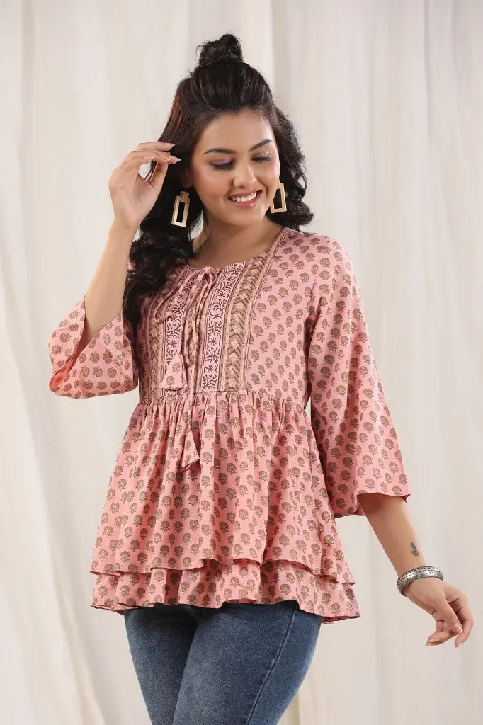 Women Peach Ethnic Motifs Printed Tie-Up Neck Peplum Top